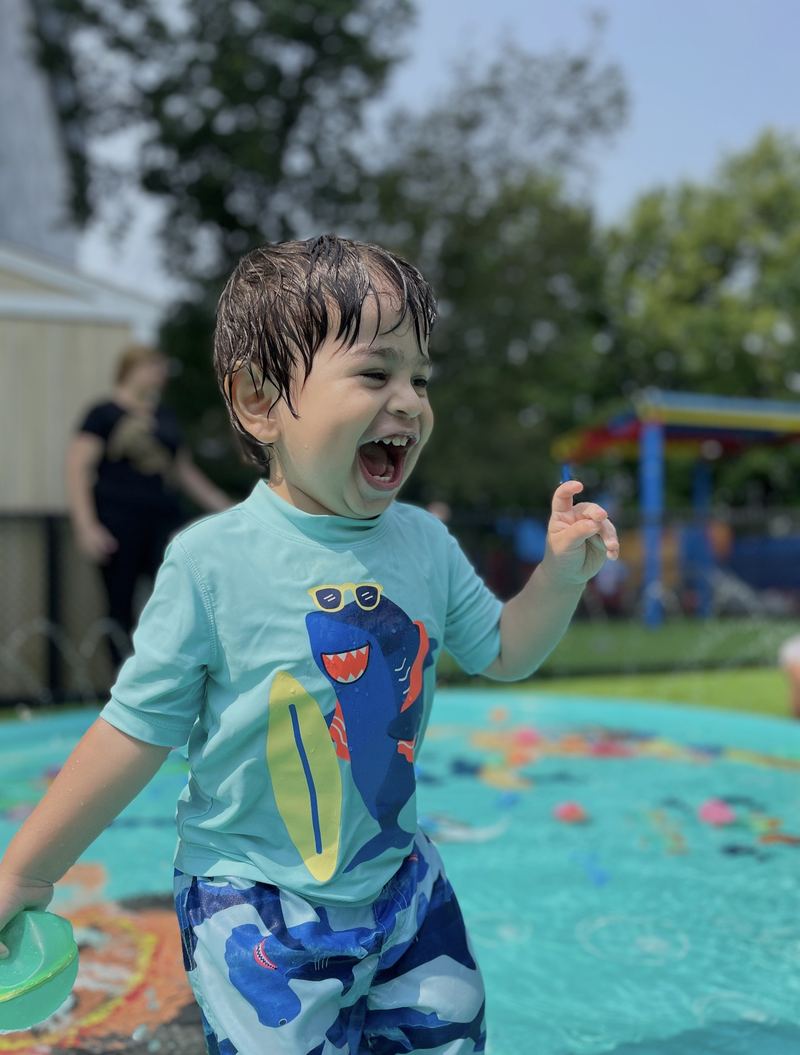 Splashing outside in summer.