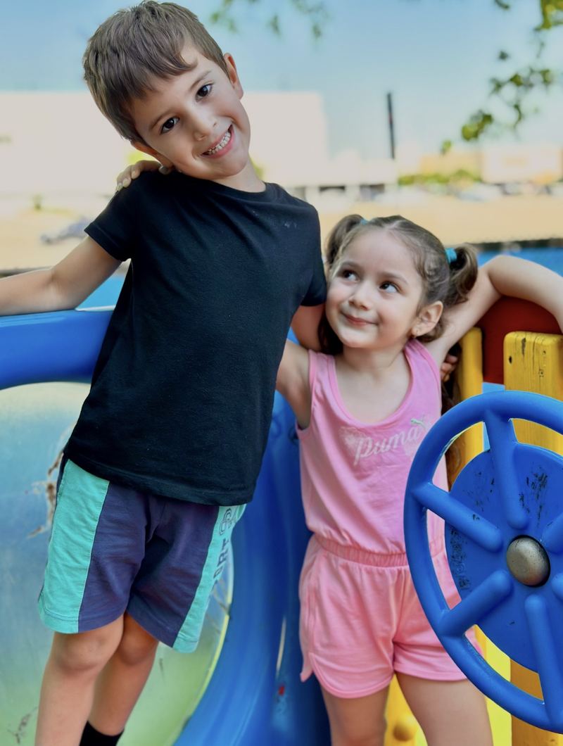 Two friends on the playground.